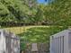 Expansive backyard with mature trees and green grass at 224 Kirkwood Dr, Chapel Hill, NC 27514