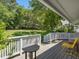 Spacious backyard viewed from the deck with lush landscaping at 224 Kirkwood Dr, Chapel Hill, NC 27514