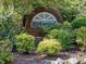 Beautiful brick sign that reads 'Kirkwood' surrounded by lush landscaping, creating a welcoming entrance at 224 Kirkwood Dr, Chapel Hill, NC 27514
