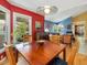 Open dining area with hardwood floors, stylish decor, and a seamless connection to the living room at 224 Kirkwood Dr, Chapel Hill, NC 27514