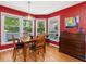 Inviting dining room bathed in natural light, featuring hardwood floors and stylish decor at 224 Kirkwood Dr, Chapel Hill, NC 27514