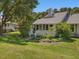 Charming home with a landscaped yard and inviting front porch for relaxing outdoors at 224 Kirkwood Dr, Chapel Hill, NC 27514