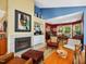 Open concept living space with a fireplace, comfortable seating, and seamless flow into the dining area at 224 Kirkwood Dr, Chapel Hill, NC 27514