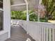 Inviting porch with gray floors and white railings, offering a tranquil outdoor space at 224 Kirkwood Dr, Chapel Hill, NC 27514