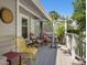 Inviting outdoor porch with comfortable seating and decorative lattice at 224 Kirkwood Dr, Chapel Hill, NC 27514