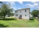 A charming two-story home featuring a well-maintained backyard with an elevated deck and easy lawn access at 2241 Spruce Shadows Ln, Raleigh, NC 27614