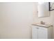 Bright bathroom featuring a single sink vanity with a granite countertop and a neutral color palette at 2241 Spruce Shadows Ln, Raleigh, NC 27614