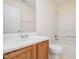 Bathroom featuring a vanity with a large mirror and a shower and tub combo at 2241 Spruce Shadows Ln, Raleigh, NC 27614
