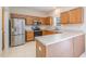 Well-equipped kitchen with stainless steel appliances and ample counter space at 2241 Spruce Shadows Ln, Raleigh, NC 27614