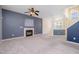 Open concept living room with cozy fireplace and lots of natural light at 2241 Spruce Shadows Ln, Raleigh, NC 27614