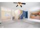 Spacious living room seamlessly connected to the kitchen and dining area at 2241 Spruce Shadows Ln, Raleigh, NC 27614
