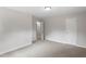 Bedroom has neutral walls, carpet, and doors leading to the hallway at 2702 Red Valley Dr, Rougemont, NC 27572