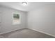 Neutral bedroom with a window showing a view of the outdoors at 2702 Red Valley Dr, Rougemont, NC 27572