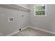 Laundry room with washer and dryer hookups and natural light at 2702 Red Valley Dr, Rougemont, NC 27572