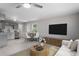 Open floor plan showing updated kitchen and living room with hardwood floors at 2702 Red Valley Dr, Rougemont, NC 27572
