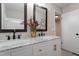 Spacious bathroom features double sinks with marble countertops and decorative gold hardware at 2905 Scuppernong Ln, Durham, NC 27703