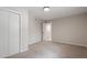 Bedroom featuring plush carpet, a closet and neutral walls at 2905 Scuppernong Ln, Durham, NC 27703