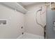 Functional laundry room with white marble floors and includes utilities for water and dryer at 2905 Scuppernong Ln, Durham, NC 27703