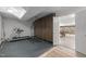 Basement gym and workout area with dark tile flooring and finished game room access at 300 Oak Ridge Dr, Hillsborough, NC 27278