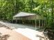 Large carport featuring a concrete floor, suitable for vehicle or equipment parking at 300 Oak Ridge Dr, Hillsborough, NC 27278
