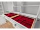 A detailed look at closet drawers featuring jewelry dividers for organization in the walk-in closet at 300 Oak Ridge Dr, Hillsborough, NC 27278
