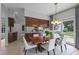 Dining area features a modern light fixture and a large table with seating for six at 300 Oak Ridge Dr, Hillsborough, NC 27278