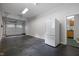 Spacious garage with fridge and direct access to the kitchen at 300 Oak Ridge Dr, Hillsborough, NC 27278
