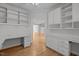 Spacious home office with custom built-ins, modern desk space and ample room for storage and organization at 300 Oak Ridge Dr, Hillsborough, NC 27278
