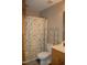 Neutral bathroom featuring a shower/tub combo with a floral shower curtain at 3145 Pier Pointe Dr, Creedmoor, NC 27522