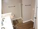 Bathroom with a walk in shower, single vanity, and tiled floors at 3145 Pier Pointe Dr, Creedmoor, NC 27522