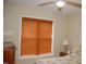 Bedroom with wood blinds, hardwood style floors, and neutral paint at 3145 Pier Pointe Dr, Creedmoor, NC 27522