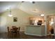 Spacious dining area with adjacent kitchen and hardwood style floors at 3145 Pier Pointe Dr, Creedmoor, NC 27522