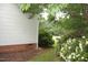 The vinyl siding and brick foundation of a well maintained home at 3145 Pier Pointe Dr, Creedmoor, NC 27522