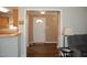 Inviting foyer featuring wood-look flooring and a front door with glass accents at 3145 Pier Pointe Dr, Creedmoor, NC 27522