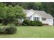 Charming single-story home features a well-maintained lawn and attractive landscaping at 3145 Pier Pointe Dr, Creedmoor, NC 27522