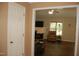 Inviting living room featuring a cozy fireplace and a seamless view from the hallway at 3145 Pier Pointe Dr, Creedmoor, NC 27522