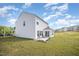 Spacious backyard featuring a well-maintained lawn and a patio area perfect for outdoor entertaining at 316 Mimosa Ct, Sanford, NC 27332