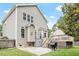 Back exterior featuring a deck and patio, perfect for outdoor entertaining and relaxation at 3217 Ranbir Dr, Durham, NC 27713