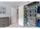 Organized walk-in closet with shelves and drawers, providing ample storage solutions at 3217 Ranbir Dr, Durham, NC 27713