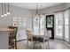 Charming breakfast nook features a stylish chandelier and lots of natural light at 3217 Ranbir Dr, Durham, NC 27713