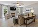 Cozy living room with fireplace, ceiling fan, and plenty of seating for entertaining at 3217 Ranbir Dr, Durham, NC 27713