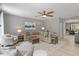 Spacious living room with lots of natural light, comfortable seating, and ceiling fan at 3217 Ranbir Dr, Durham, NC 27713
