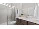 Clean and bright bathroom with a glass shower and a modern vanity at 3421 Lebrun Path, Fuquay Varina, NC 27526