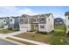 Charming two-story home with neutral siding, gray accents, and a well-manicured lawn at 3421 Lebrun Path, Fuquay Varina, NC 27526