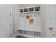 Functional mudroom with built-in bench, storage cubbies, and hooks for organizing coats, bags, and accessories at 3421 Lebrun Path, Fuquay Varina, NC 27526