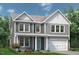Charming two-story home with gray siding, white trim, front porch and landscaped yard at 35 Windflower Court Ct # Homesite 9, Clayton, NC 27520