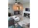 Upstairs living room featuring a ceiling fan, bar, and comfortable furniture at 35 Windflower Court Ct # Homesite 9, Clayton, NC 27520