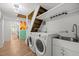 Functional laundry room with stainless steel sink and washer/dryer hookups at 3516 Swift Dr, Raleigh, NC 27606