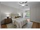Inviting bedroom with stylish decor, a cozy window seat, and neutral colors at 387 Riverstone Dr, Pittsboro, NC 27312