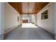 Covered breezeway with stylish lighting, connecting the garage to the main house with curb appeal at 387 Riverstone Dr, Pittsboro, NC 27312